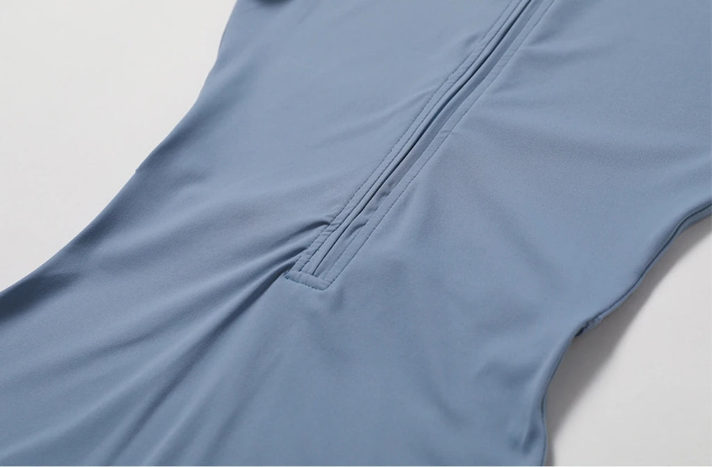 Combinaison de yoga une pièce européenne et américaine nude avec col montant, demi-fermeture éclair, combinaison de fitness à manches courtes, coupe ajustée