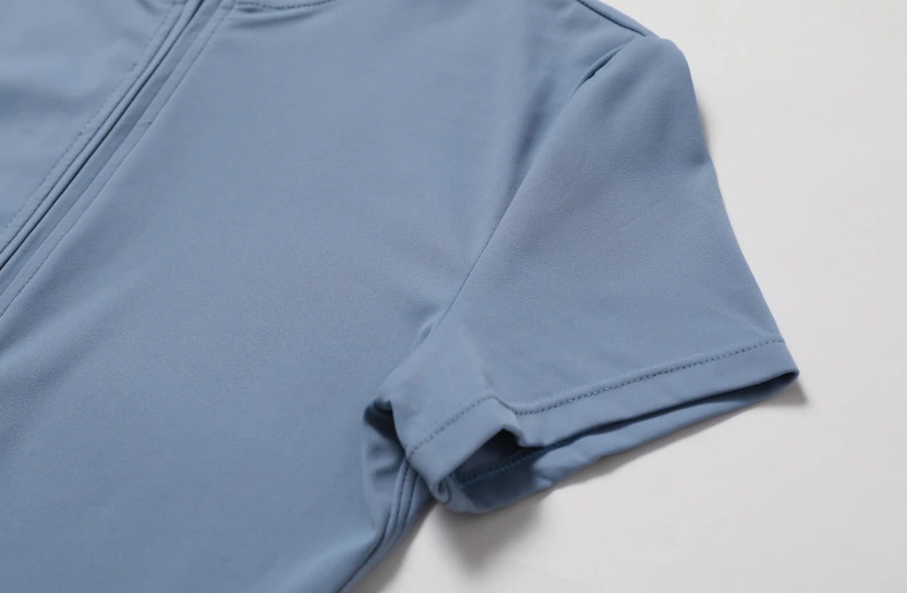 Combinaison de yoga une pièce européenne et américaine nude avec col montant, demi-fermeture éclair, combinaison de fitness à manches courtes, coupe ajustée