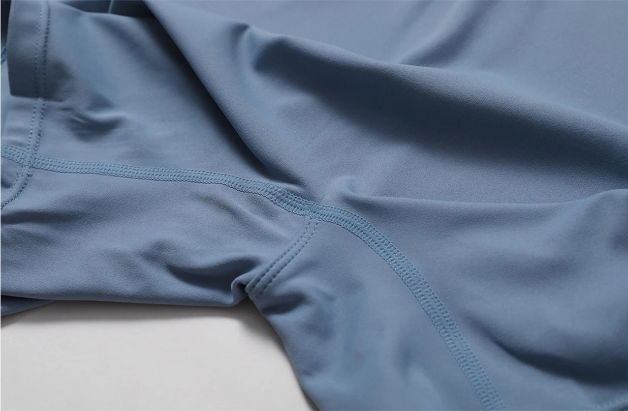 Combinaison de yoga une pièce européenne et américaine nude avec col montant, demi-fermeture éclair, combinaison de fitness à manches courtes, coupe ajustée